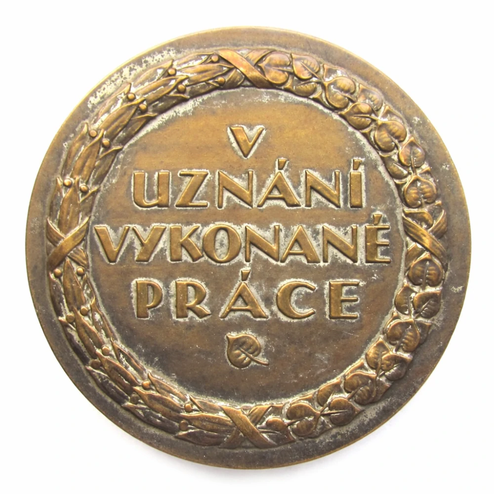 Ocenění „V uznání vykonané práce“ – Zemská jednota společenstev kadeřníků, holičů a vlásenkářů v Čechách, bronzová spolková medaile