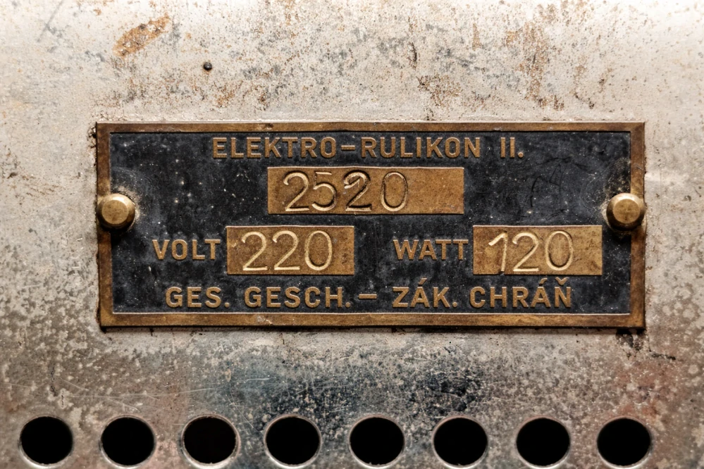 Historický elektrický nahřívač kulmovacích kleští ELEKTRO-RULÍKON II, Československo, cca 1930–1945.